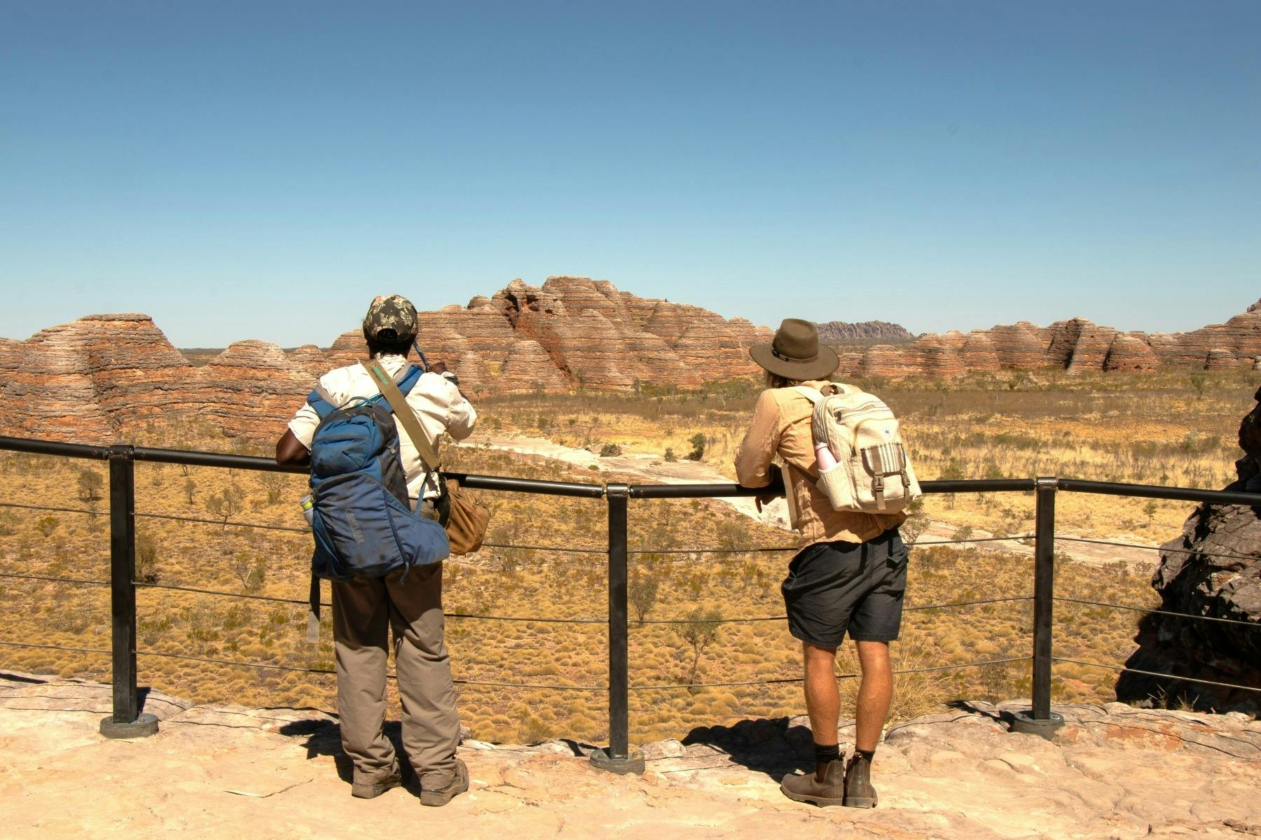 Head guide and guests at the lookout, with panoramic views of the Bungles Range