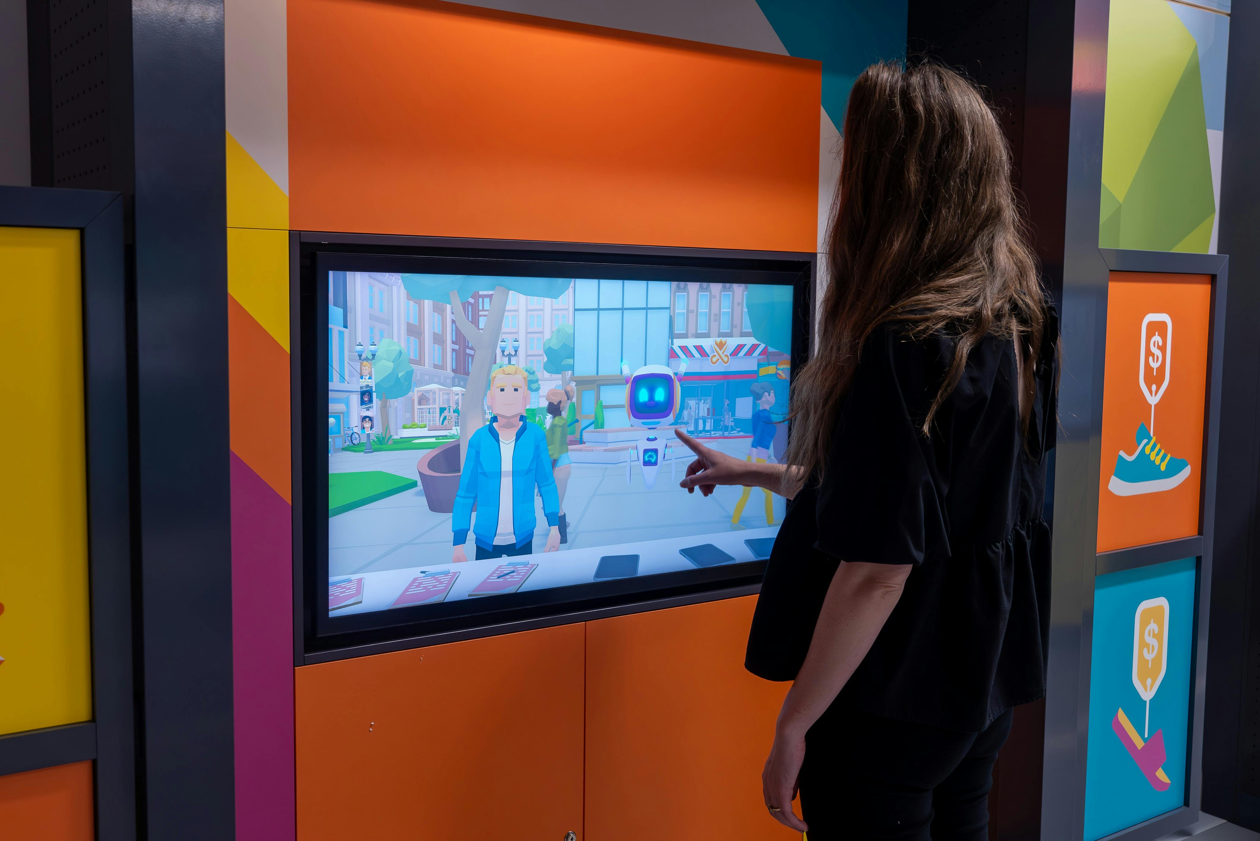 Woman playing touchscreen game in DemocraCity