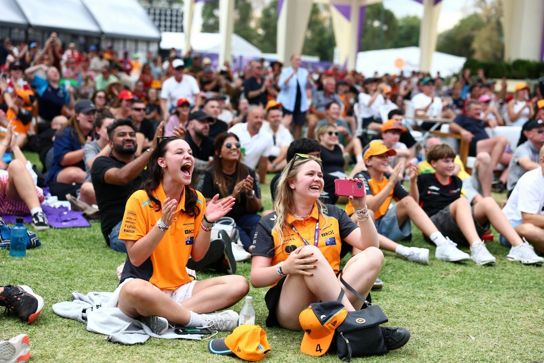 Audience members cheering