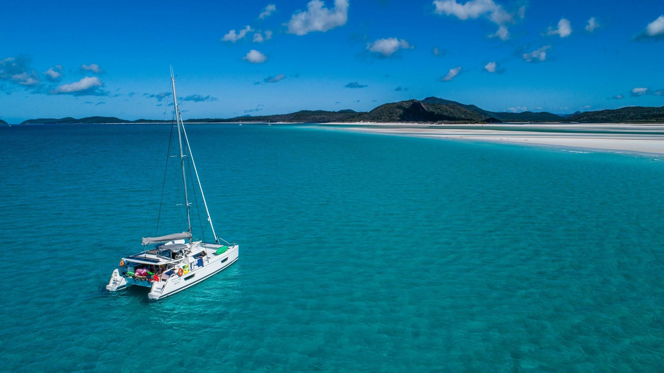 Sailing catamaran at Hill Inlet