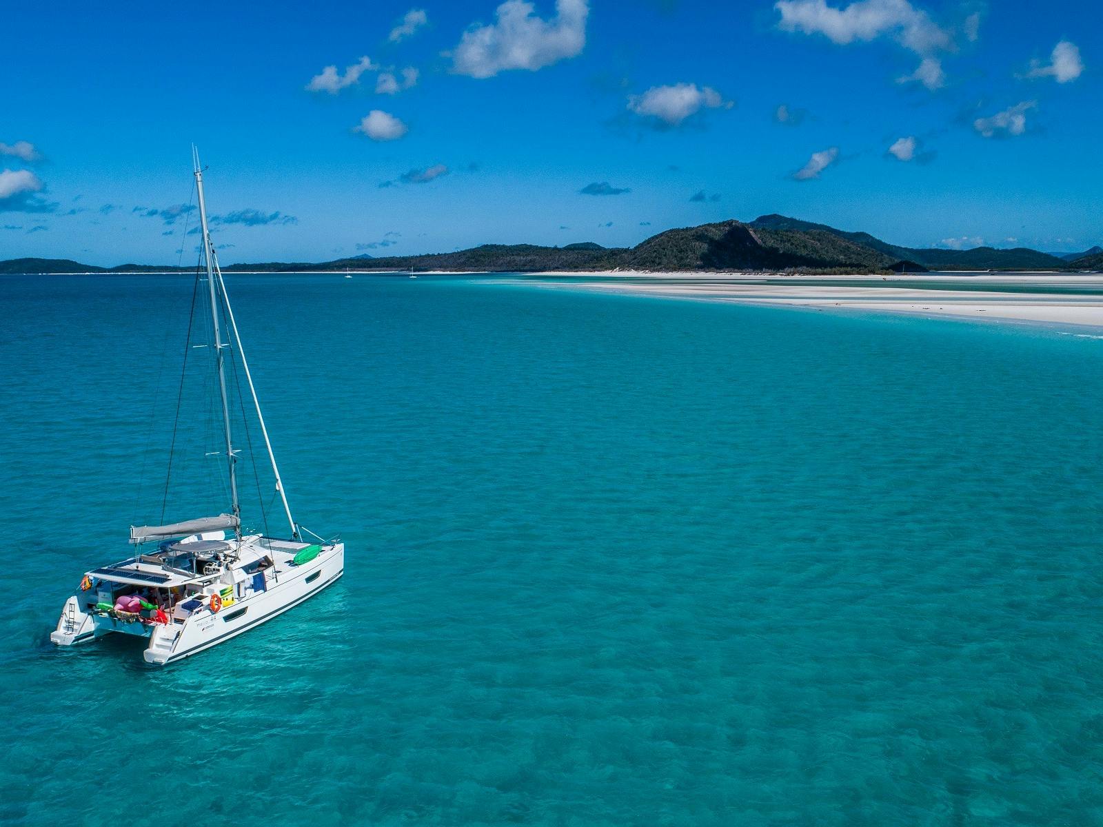 Sailing catamaran at Hill Inlet Sailing catamaran at Hill Inlet