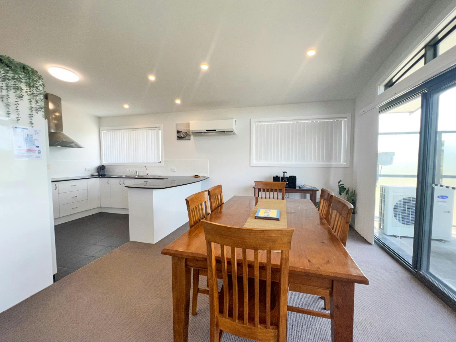 Dining area near the kitchen with AC