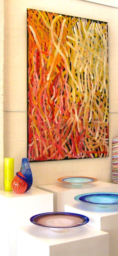 Large, contemporary Aboriginal art paintings. Carved coolamons, carved birds, handcrafted glass.