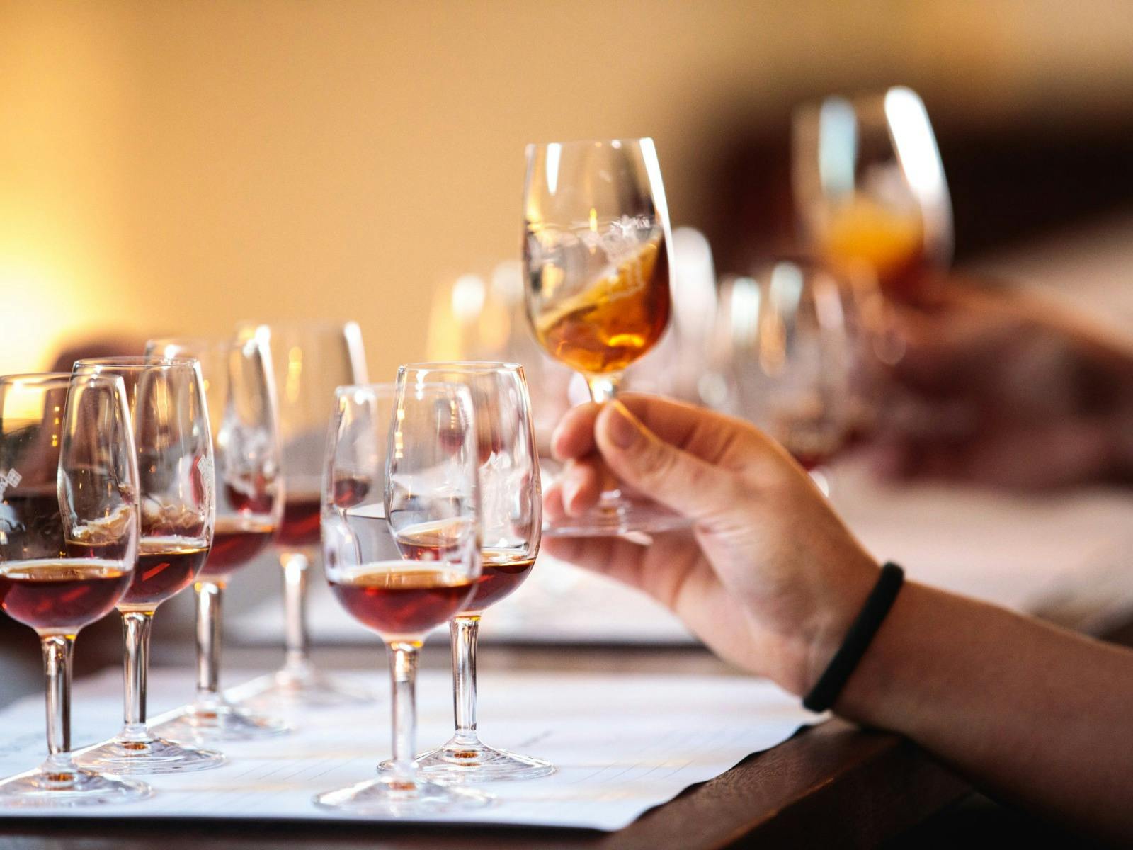 A line of glasses with samples of fortified wines
