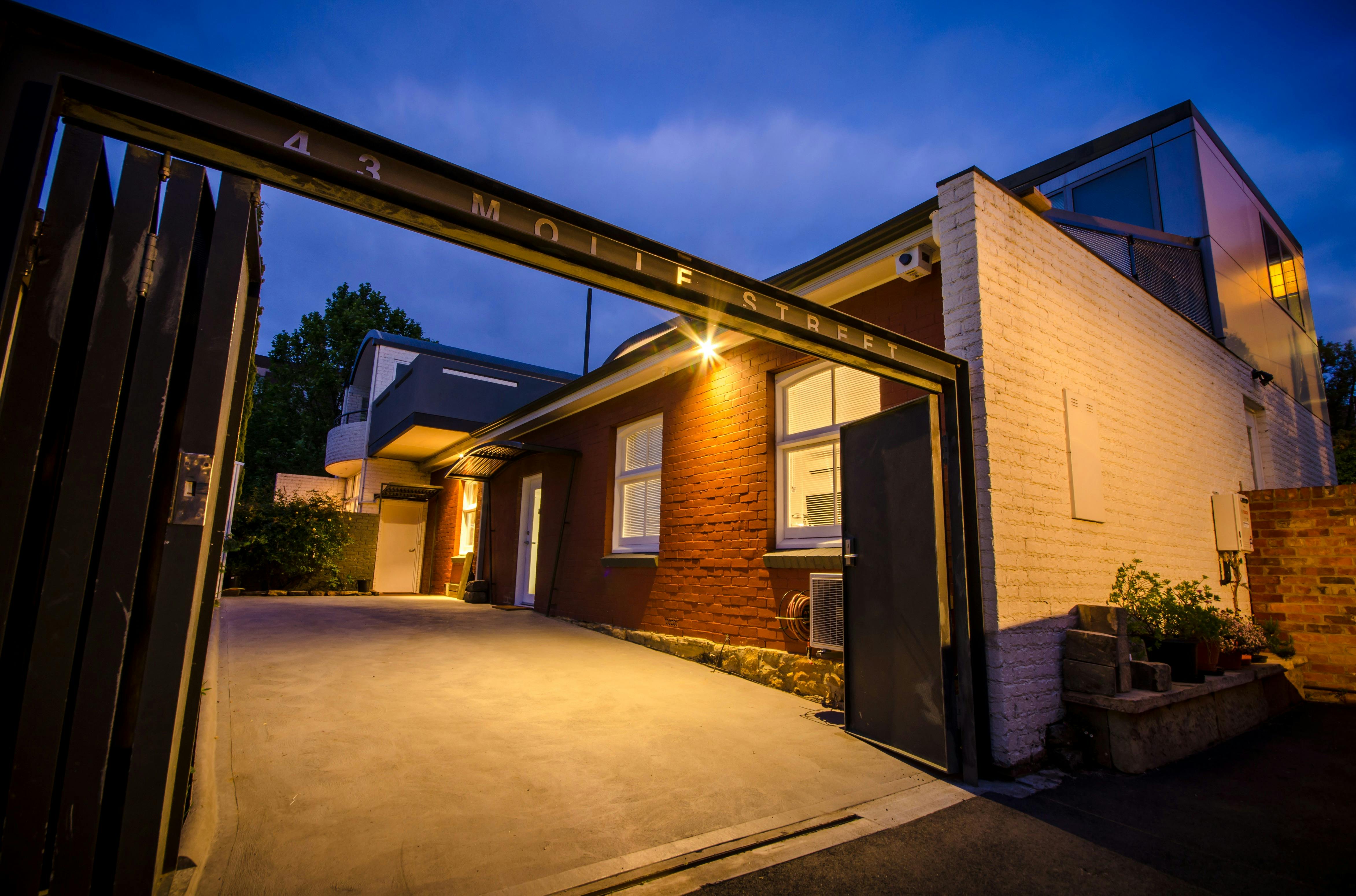 Twilight exterior of Hobart Cityscape Apartment 4 Studio at 43 Molle Street