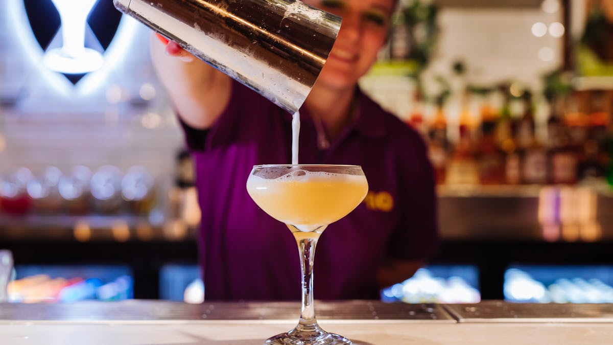 Grab your favourite cocktail at Holey Moley Chermside
