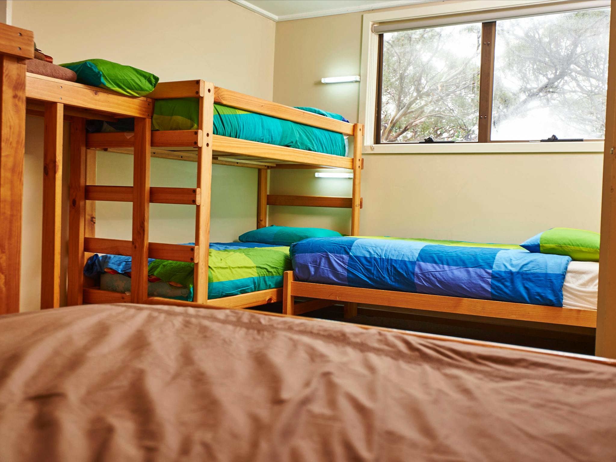 Room 5 with queen bed and ensuite at Cawarra Ski Club Mt Buller Accommodation
