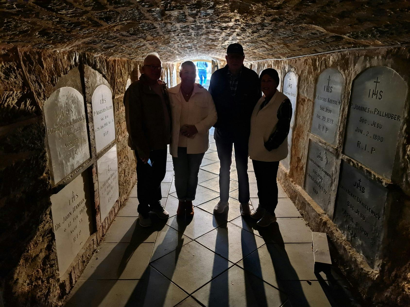 A group exploring the Crypt at St Aloysius