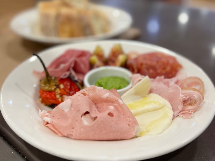 Deli meats and cheese sliced to order with accompanying local condiments and fresh bread