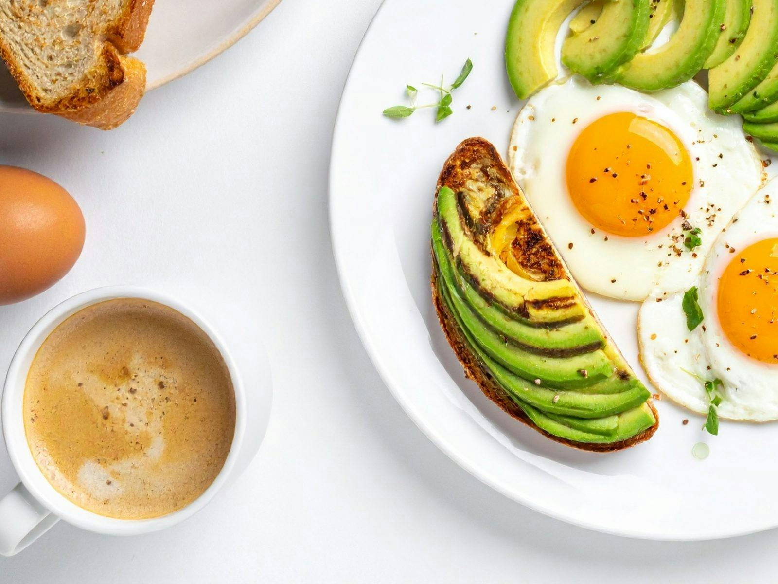 Cofee with avocado and eggs