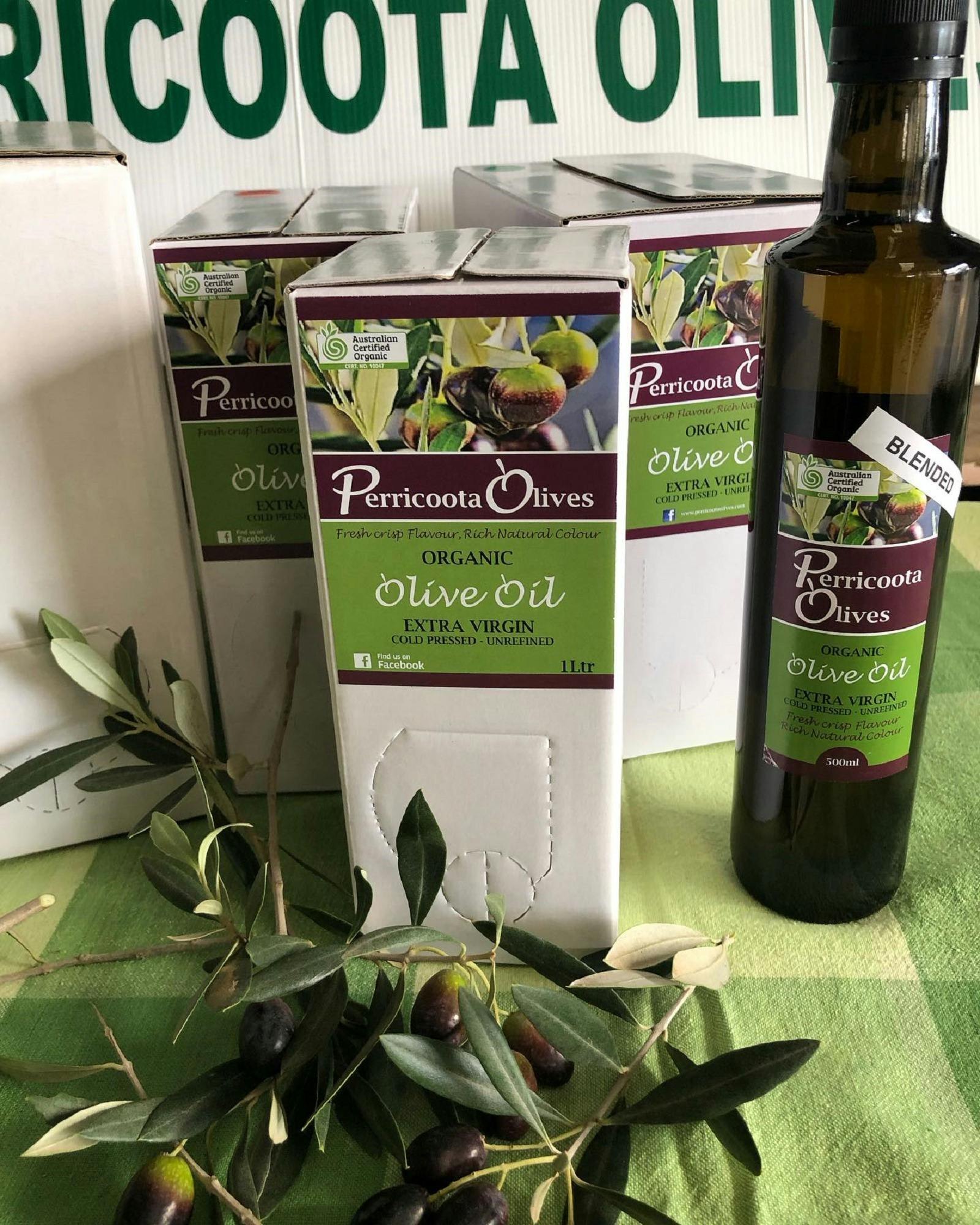large box and bottle of Perricoota Olives branded Olive Oil