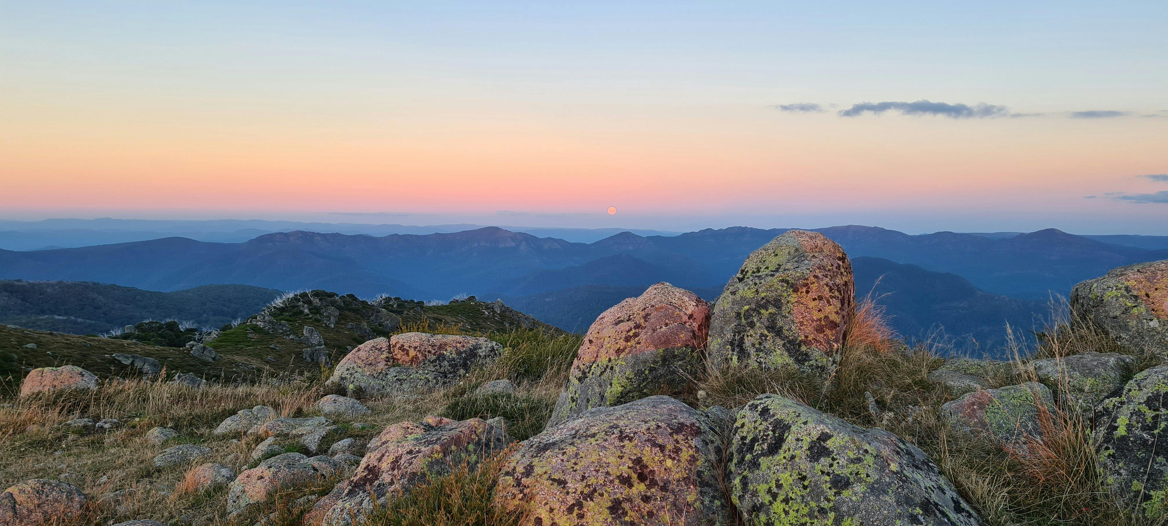 Moon rising above Mt Buggery. View of Mt Speculation and The Crosscut Saw with soft pink in the sky.