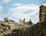 Person wandering Adelong Falls Gold Mill Ruins