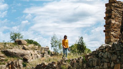 Person wandering Adelong Falls Gold Mill Ruins