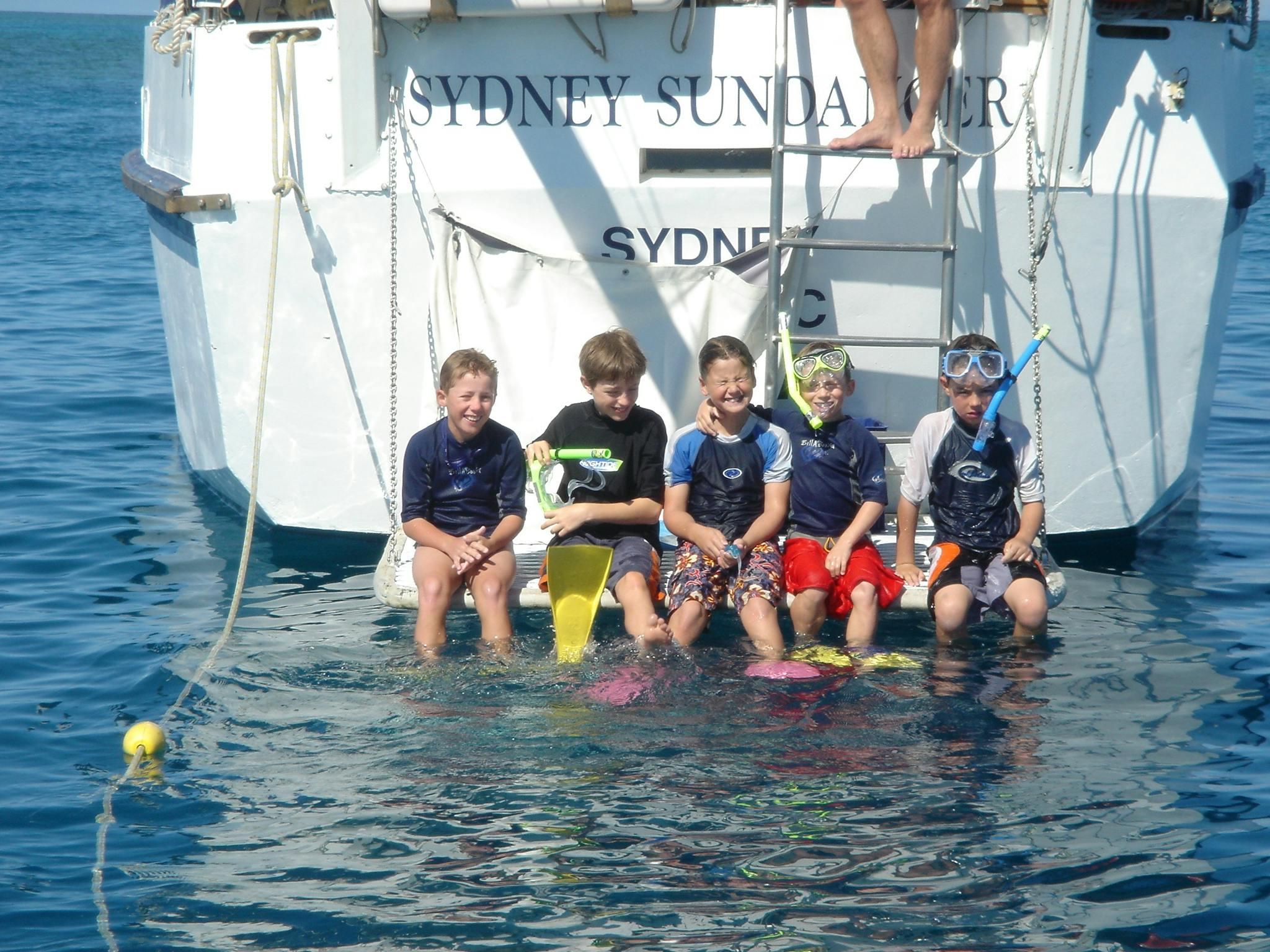 There is a long ladder under the transom to make exiting the water so easy. There is a long ladder under the transom to make exiting the water so easy.