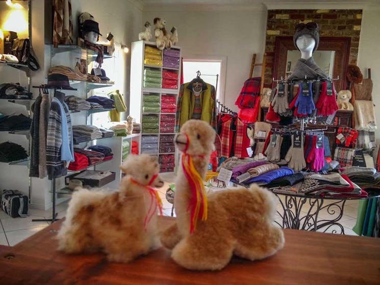 Inside Australian Alpaca Barn Hunter Valley Gardens Store showing a selection of Alpaca garments