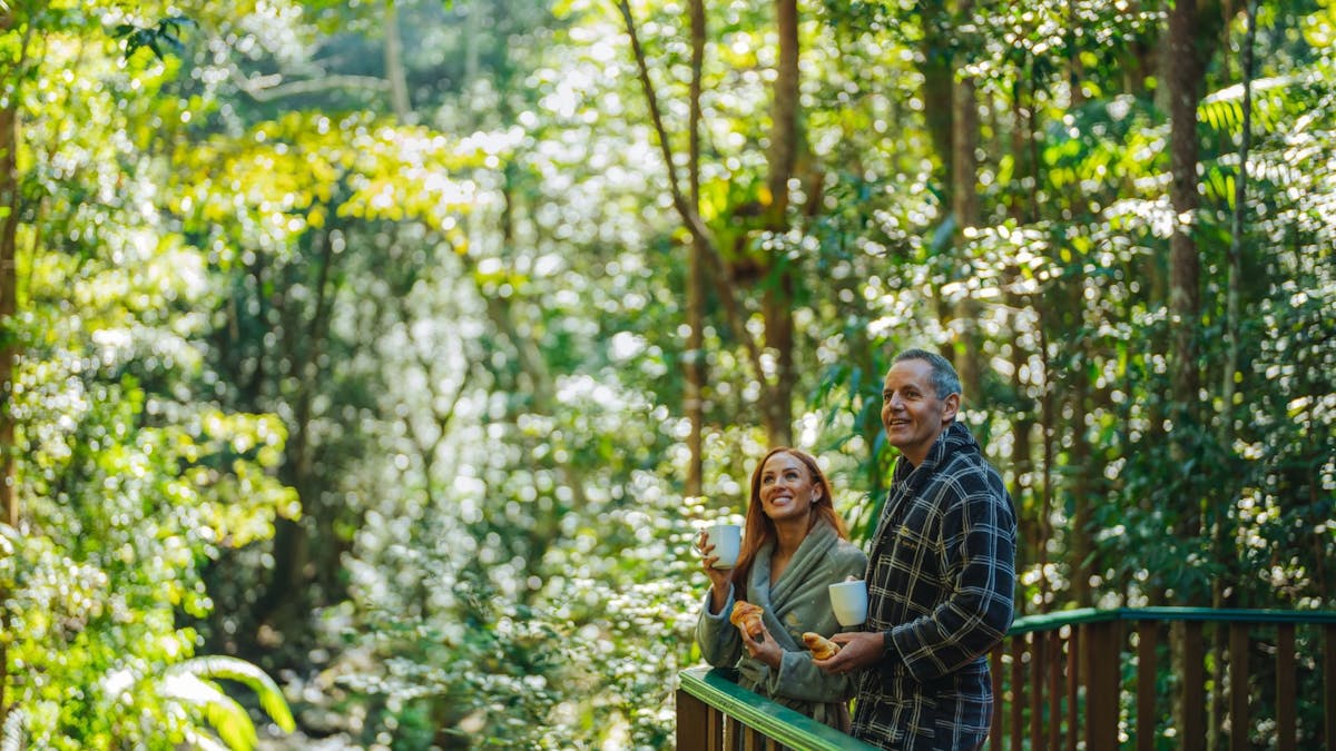 Couple on deck Narrows Escape Rainforest Retreat Montville