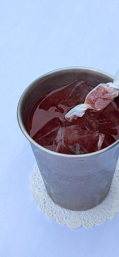 cocktail with lolly garnish