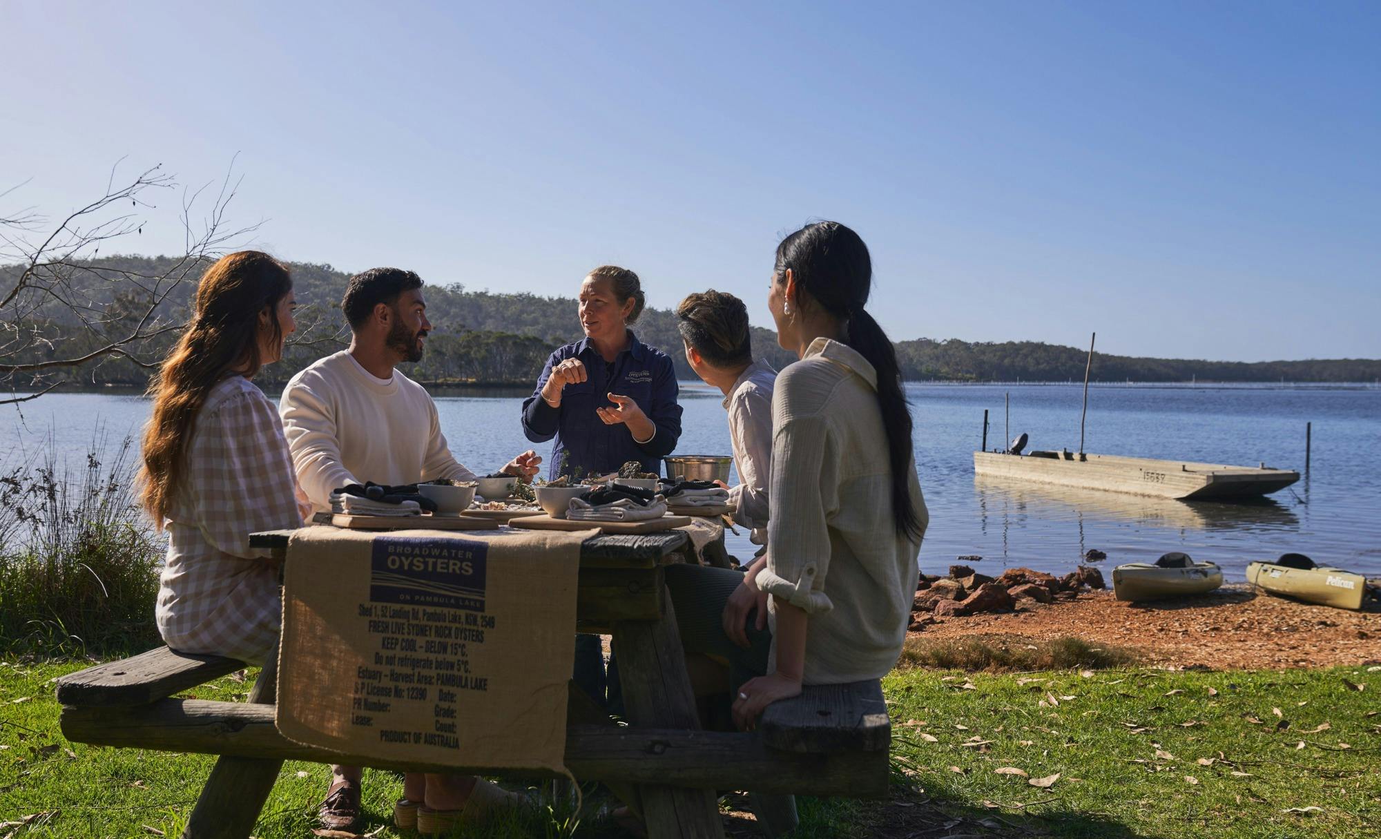 Guests learning how to shuck oysters