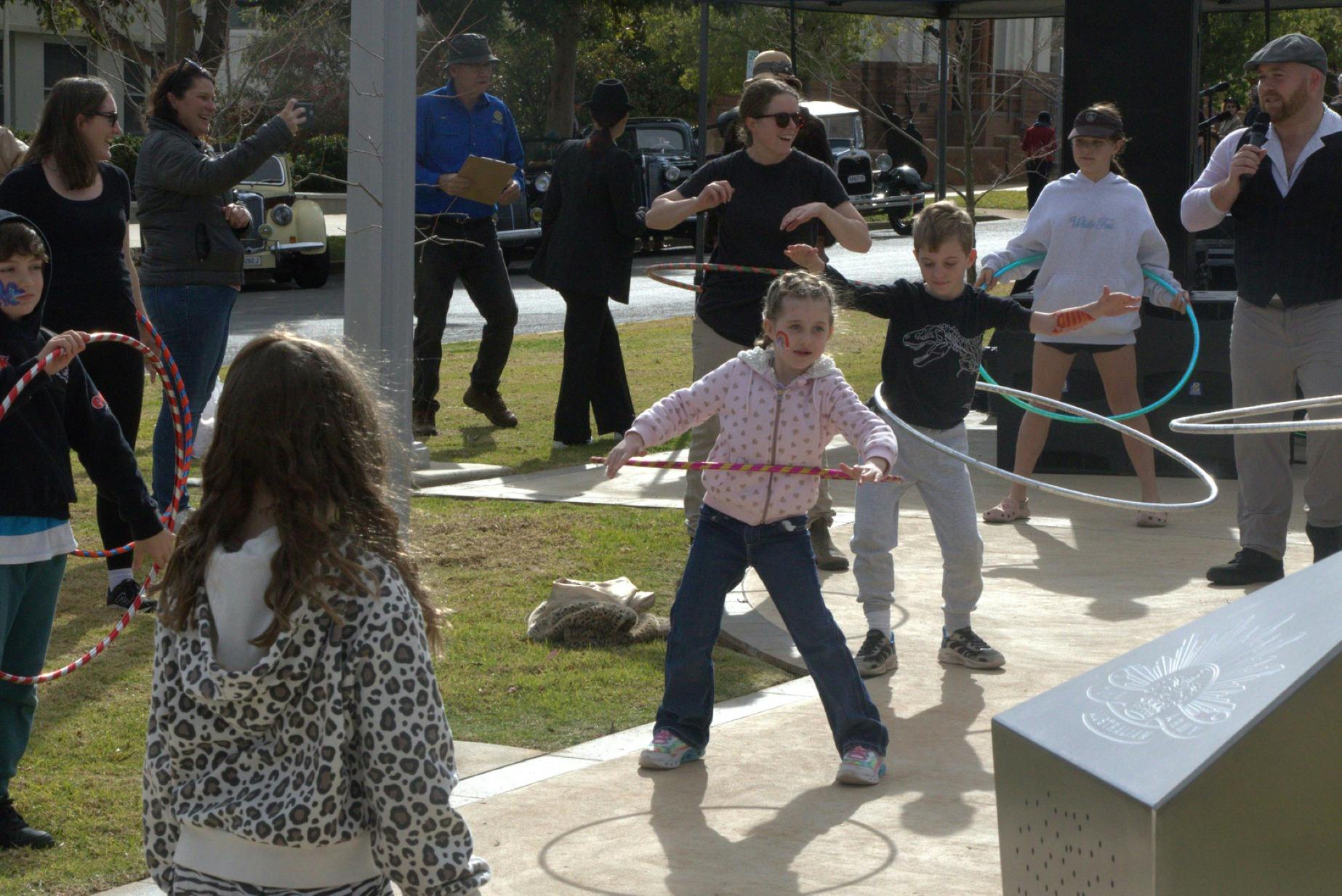 Children hula hooping at Chelmsford Place in Leeton.