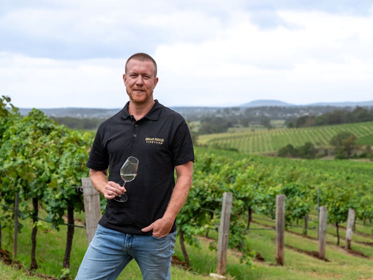 Andrew Duff in vineyard smiling