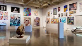 A selection of artworks including paintings and sculpture in the gallery space