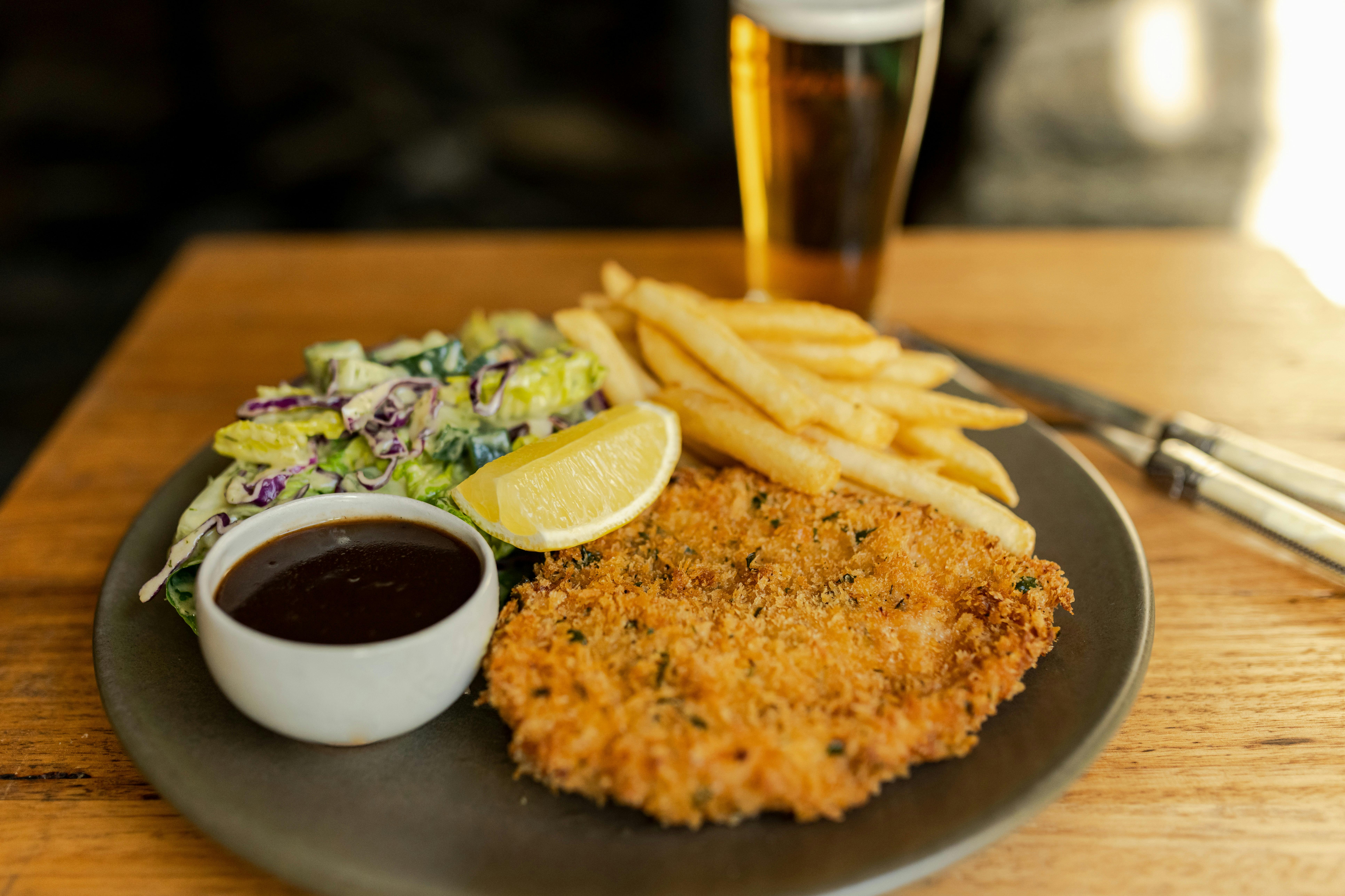 house crumbed chicken schnitzel