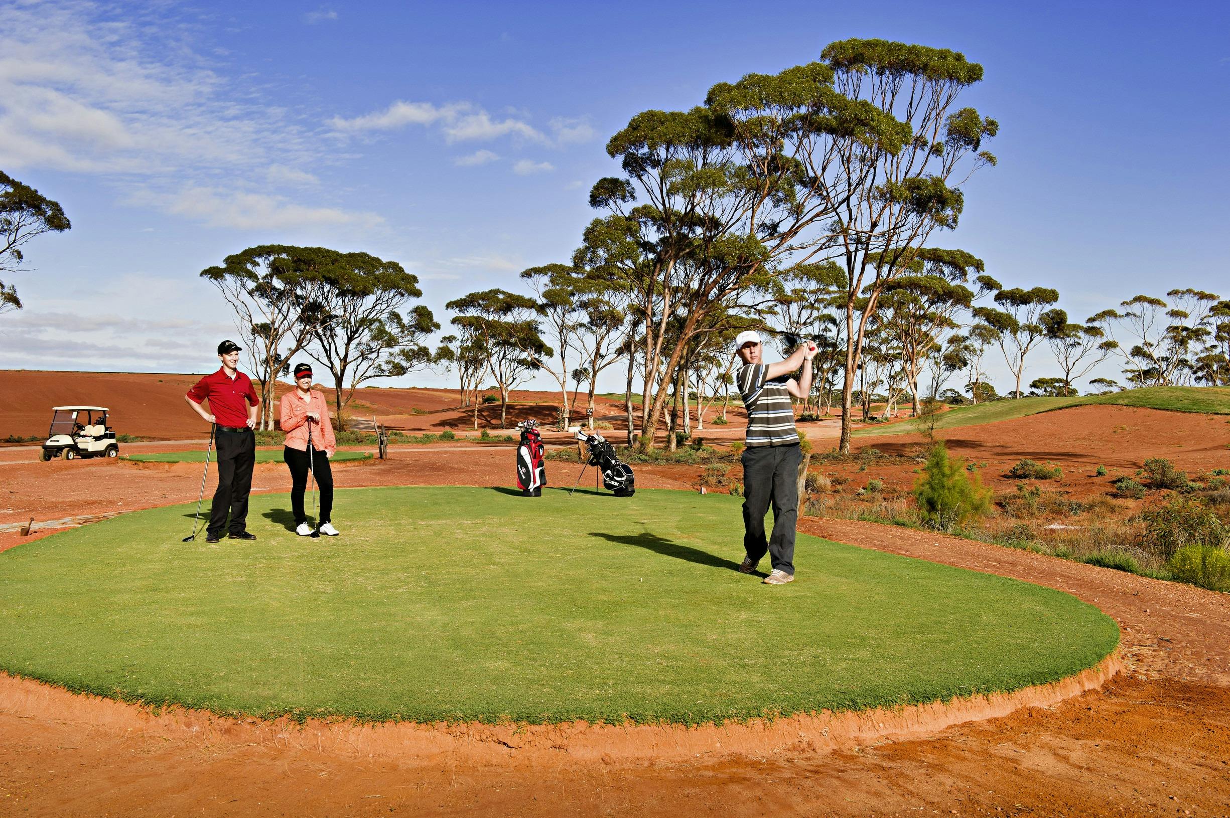 Group playing golf at the Kalgoorlie Golf Course, Kalgoorlie, Western Australia