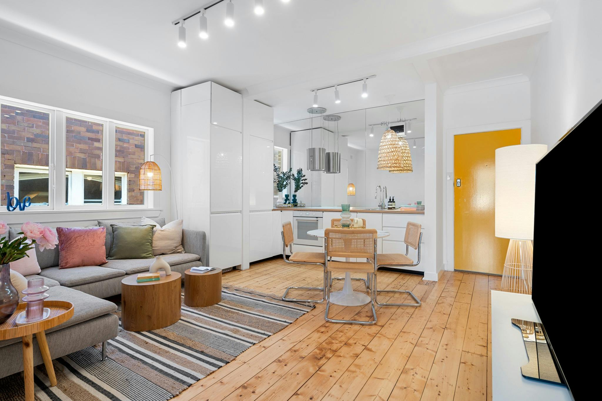 Belle’s at Bondi Beach two-bedroom apartment with living and dining areas