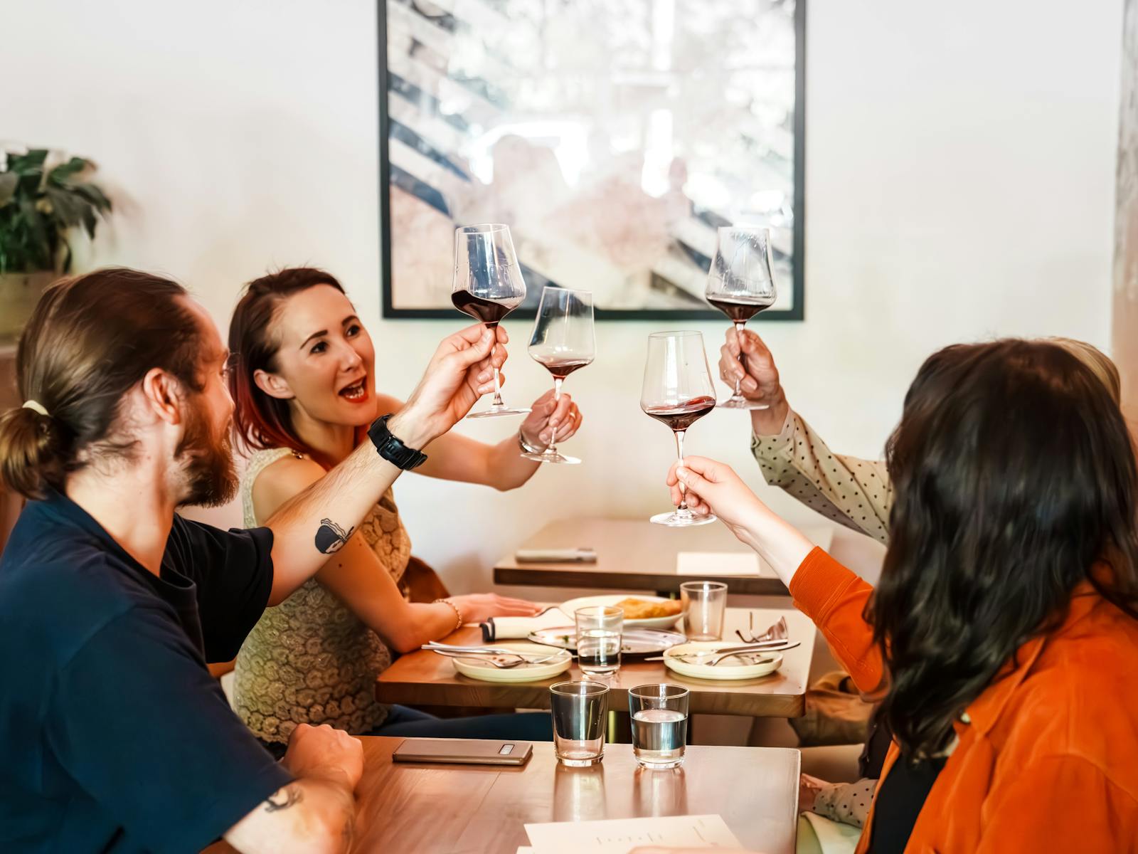 Friends enjoying northern Tasmanian wine at Havilah