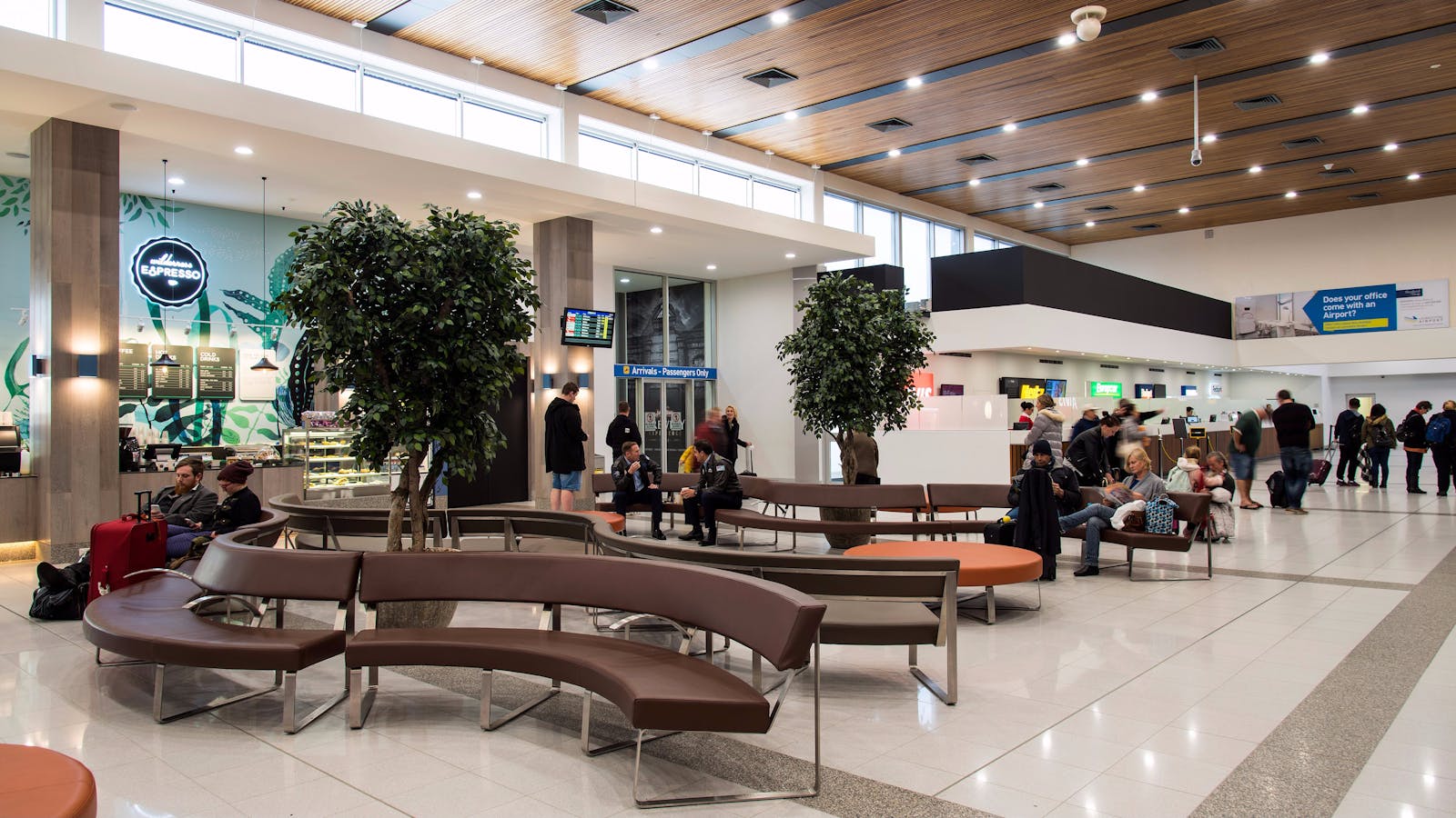 Passengers relax in the departure lounge