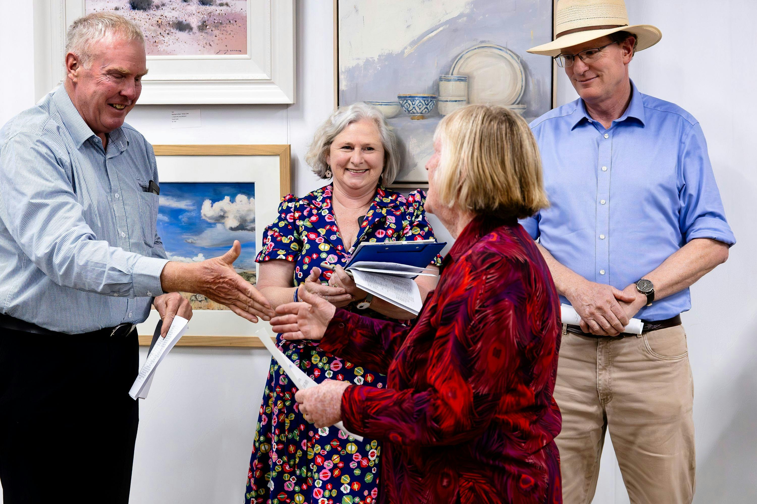 Blayney Shire Mayor Cllr Bruce Reynolds congratulates local artist Wendy Smith
