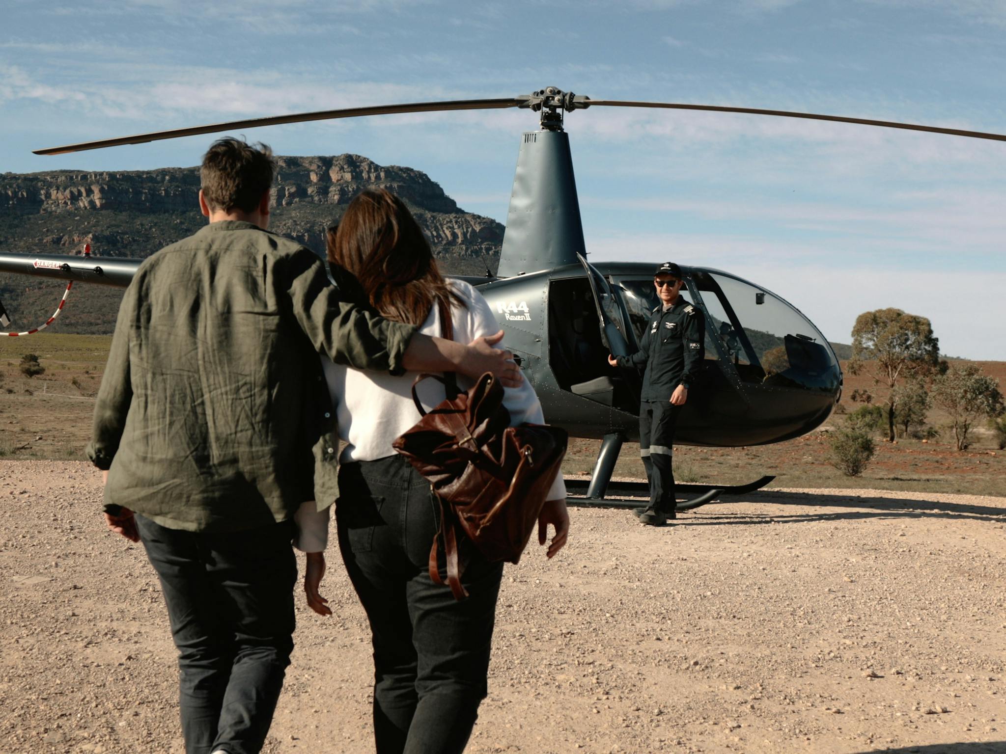Couple taking the helicopter to Chace Range