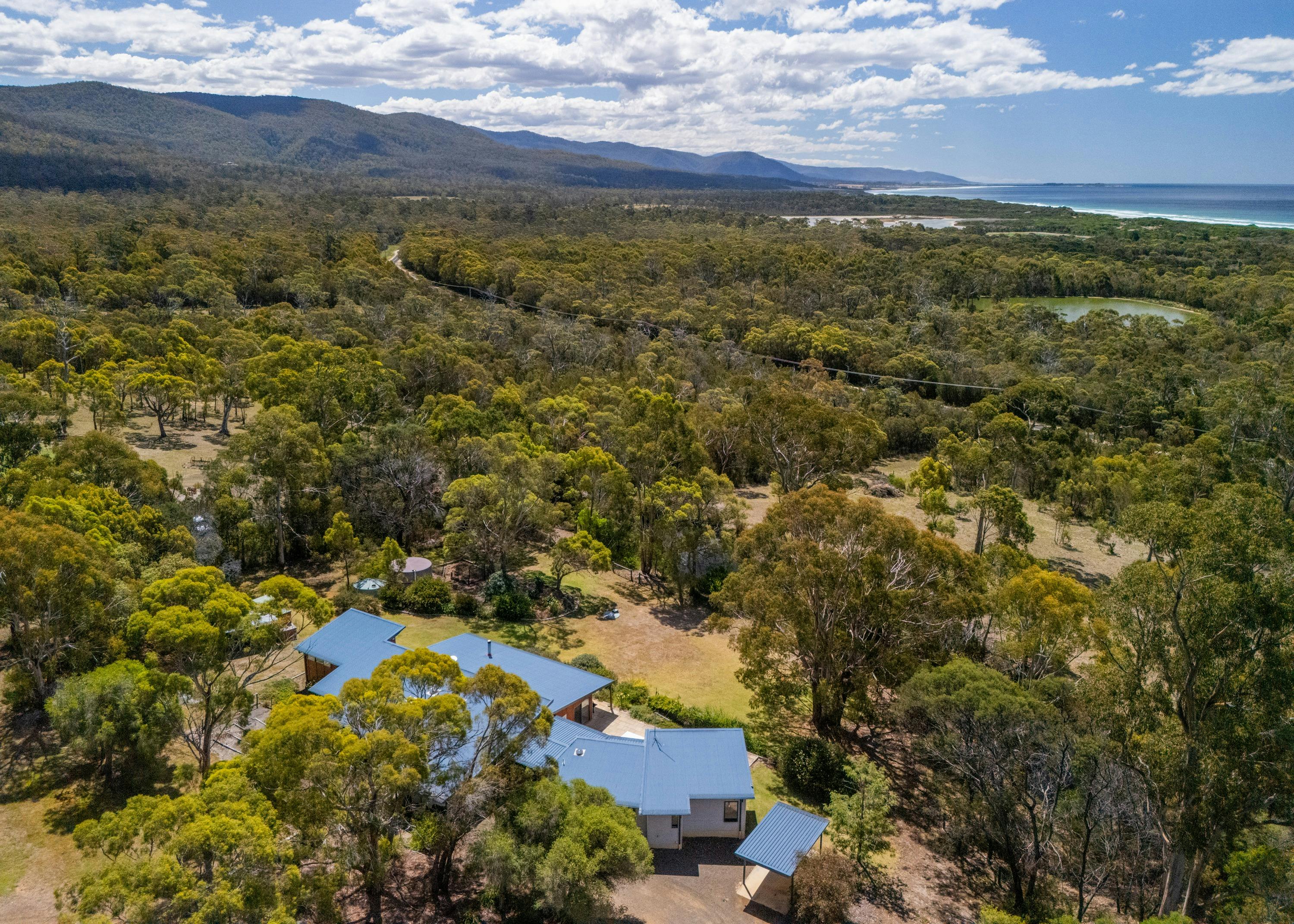 View over roof of house to Denison Beach