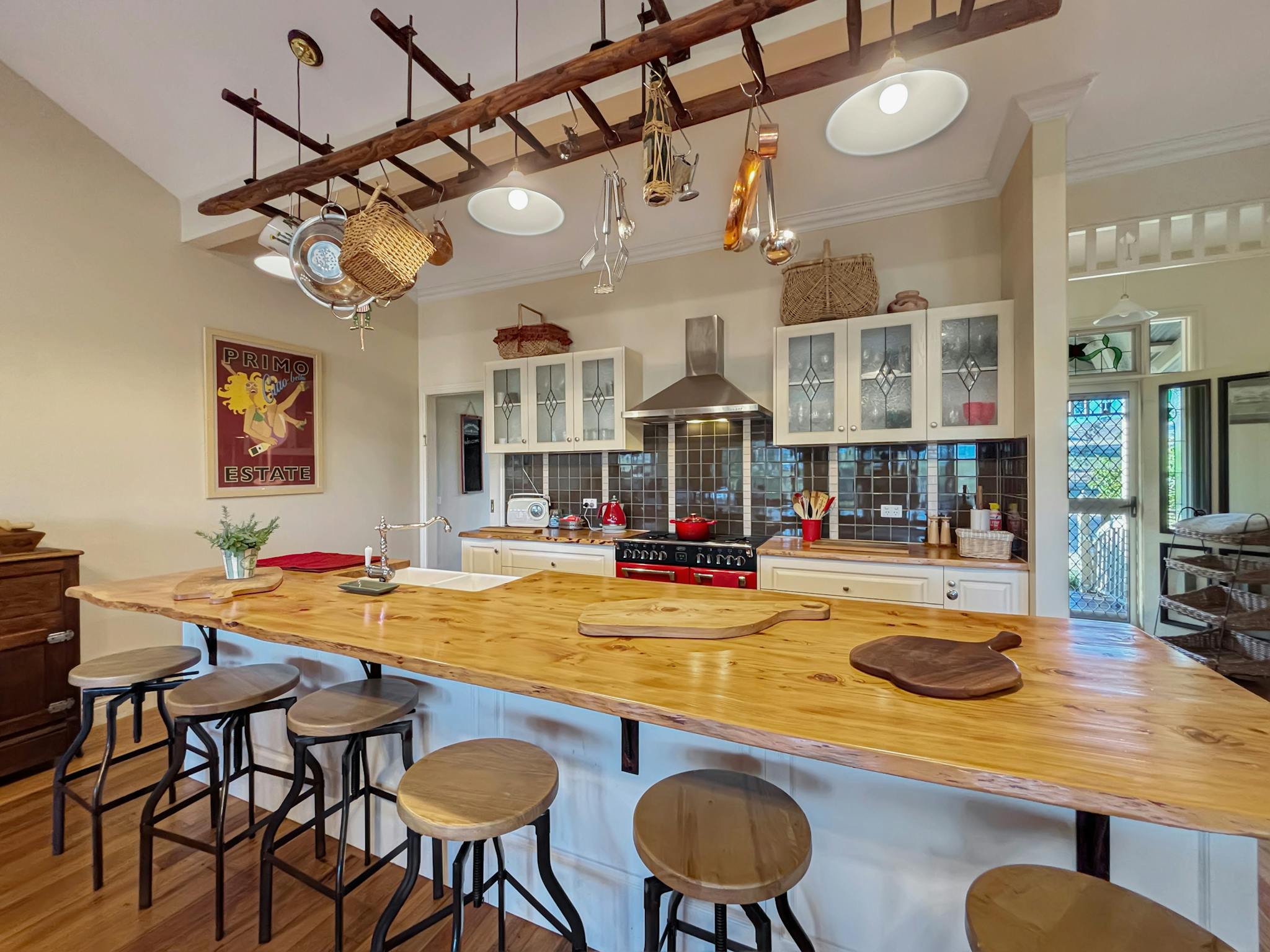 Kitchen with large island and multiple stools at Rosedale House Mansfield