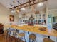 Kitchen with large island and multiple stools at Rosedale House Mansfield
