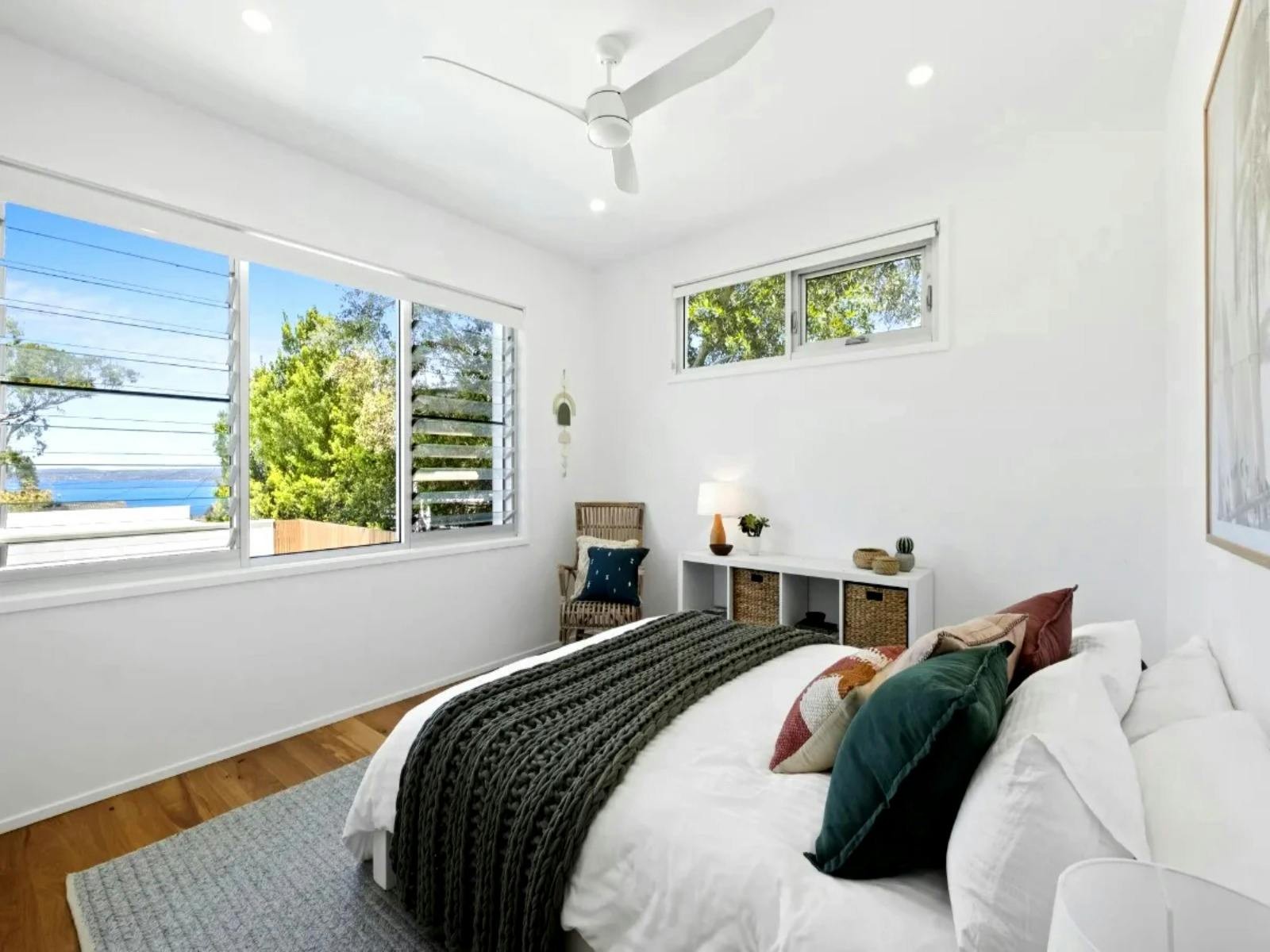 Master ensuite featuring a custom walk-in robe and luxurious bathtub for ultimate relaxation