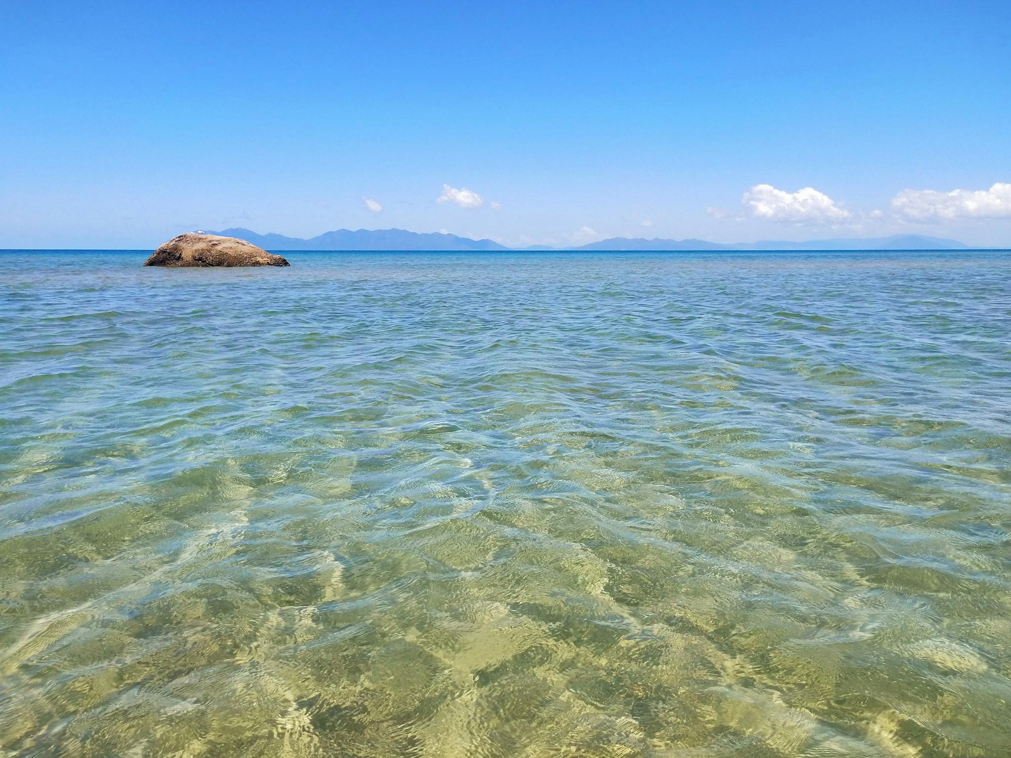Island view from beach with clear water Island view from beach with clear water