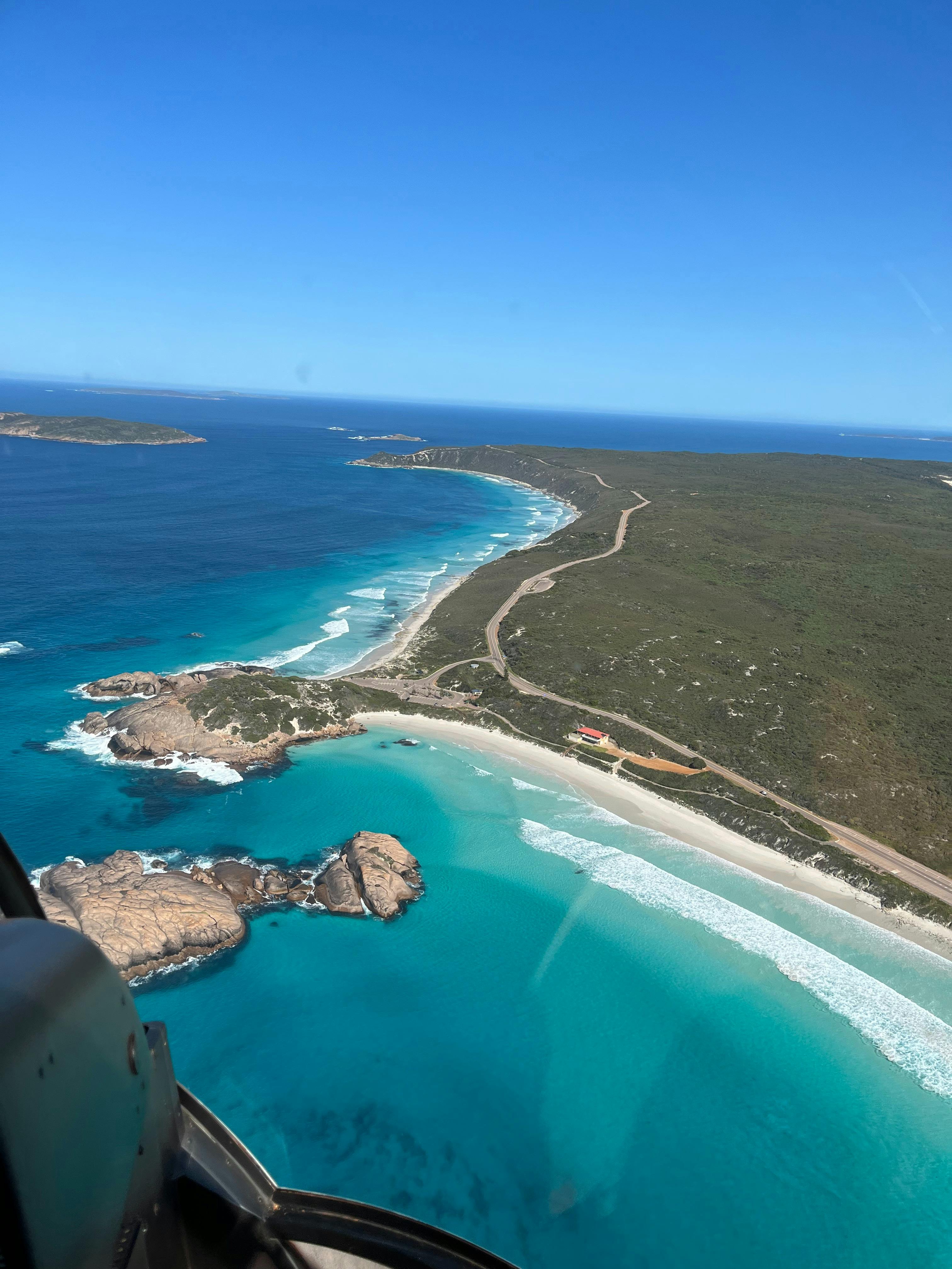 Helicopter flying over Esperance Coast