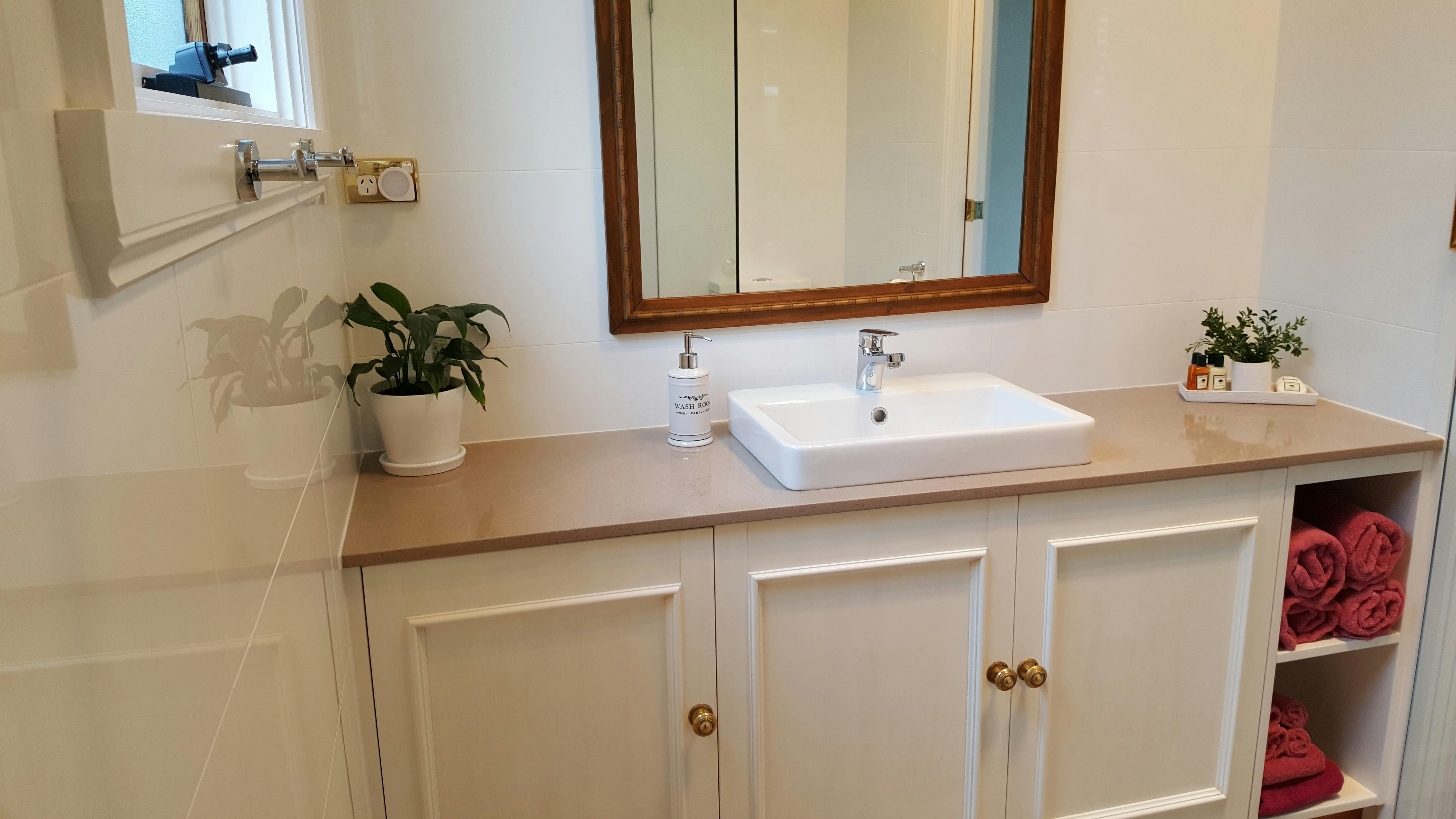 Private bathroom with walk-in shower and toilet