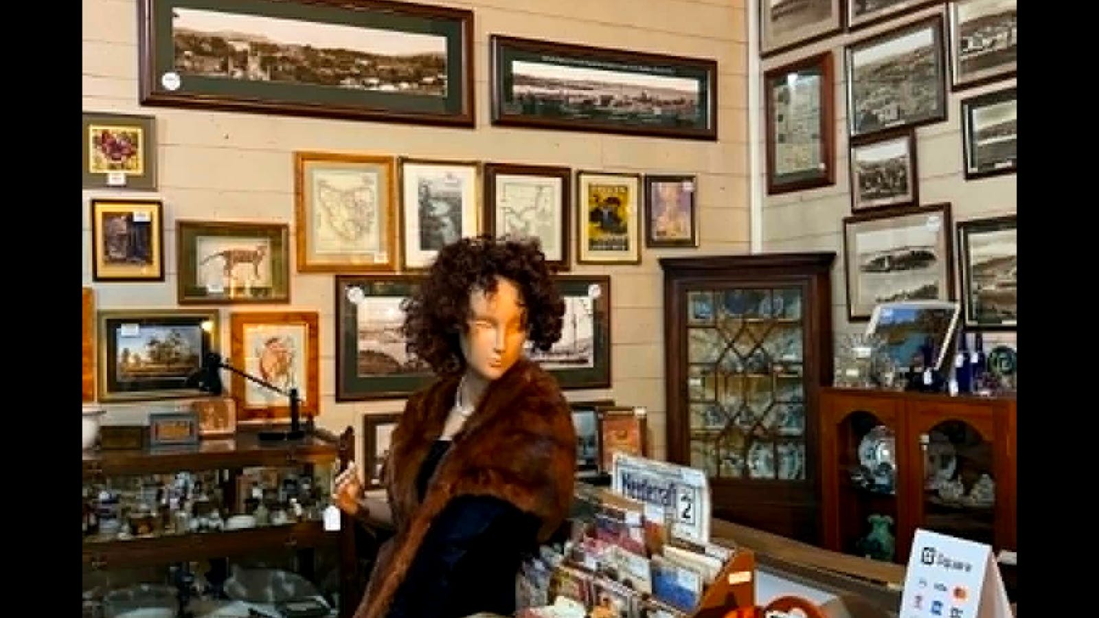 Tasmanian history wall with vintage fashion, photographs and framed prints