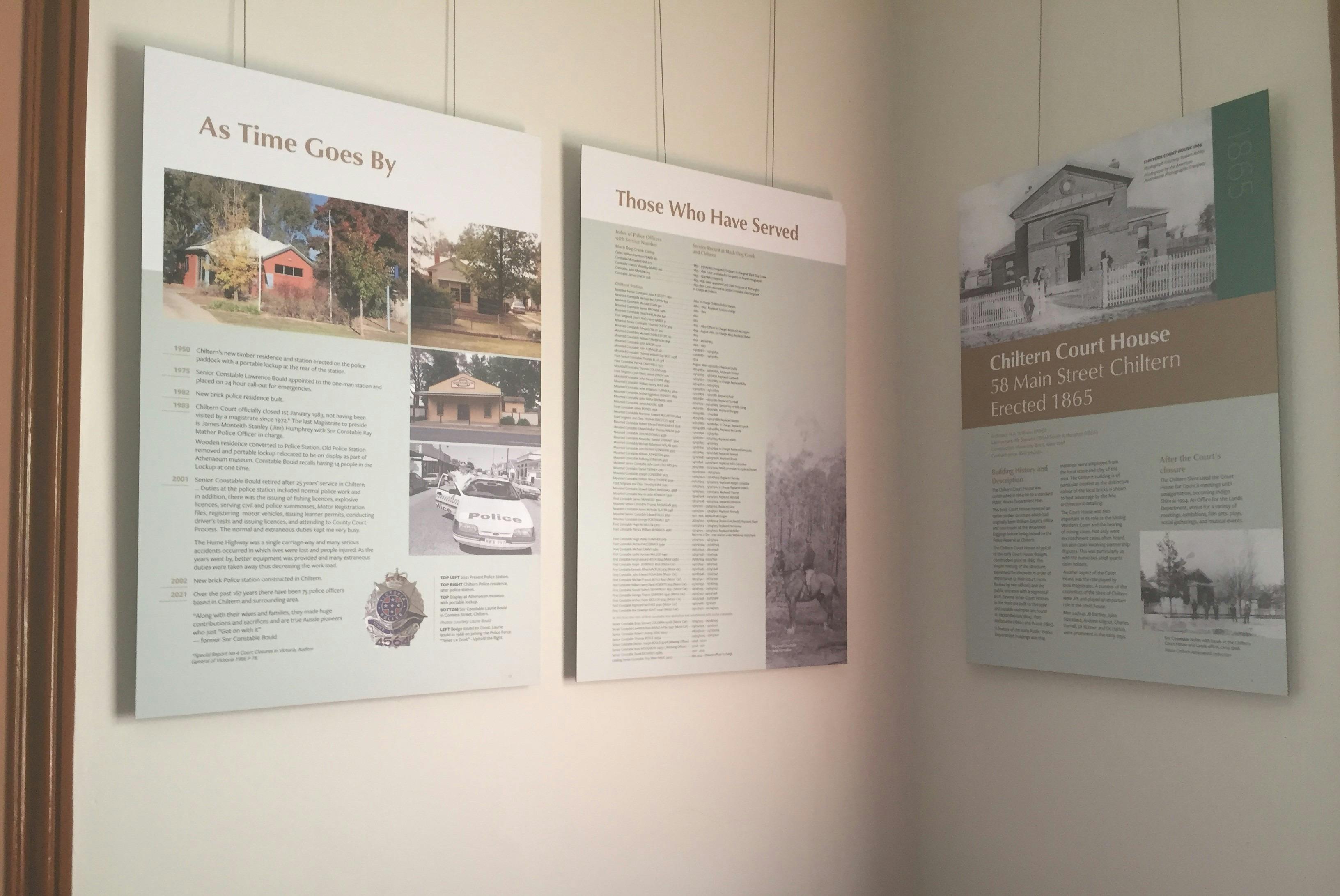 Aluminium boards with text on court house, police officers who served, as time goes by.