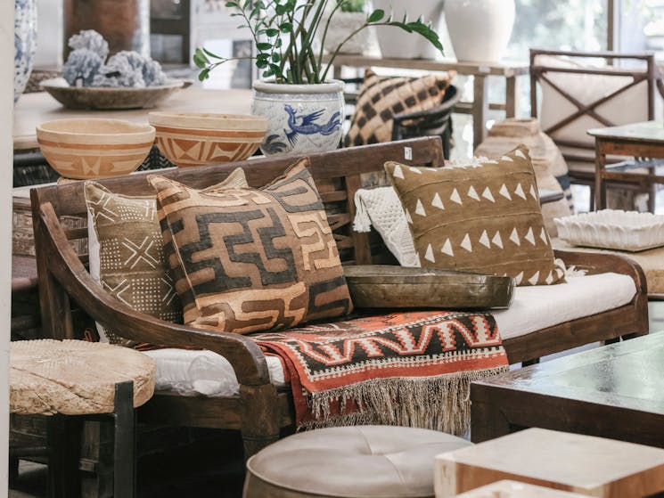 African textiles, vintage Turkish kilim rug, vintage Balinese daybed.