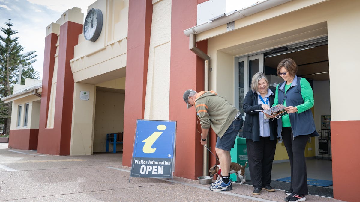 Volunteers serve with a smile