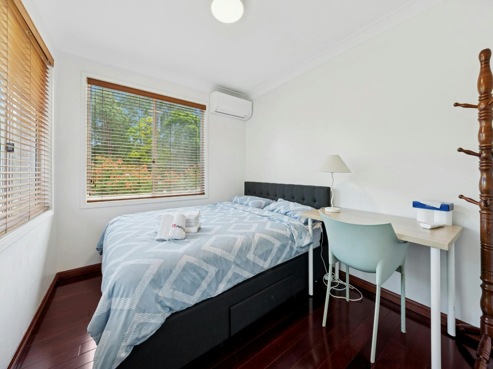 Bedroom with dedicated workspace