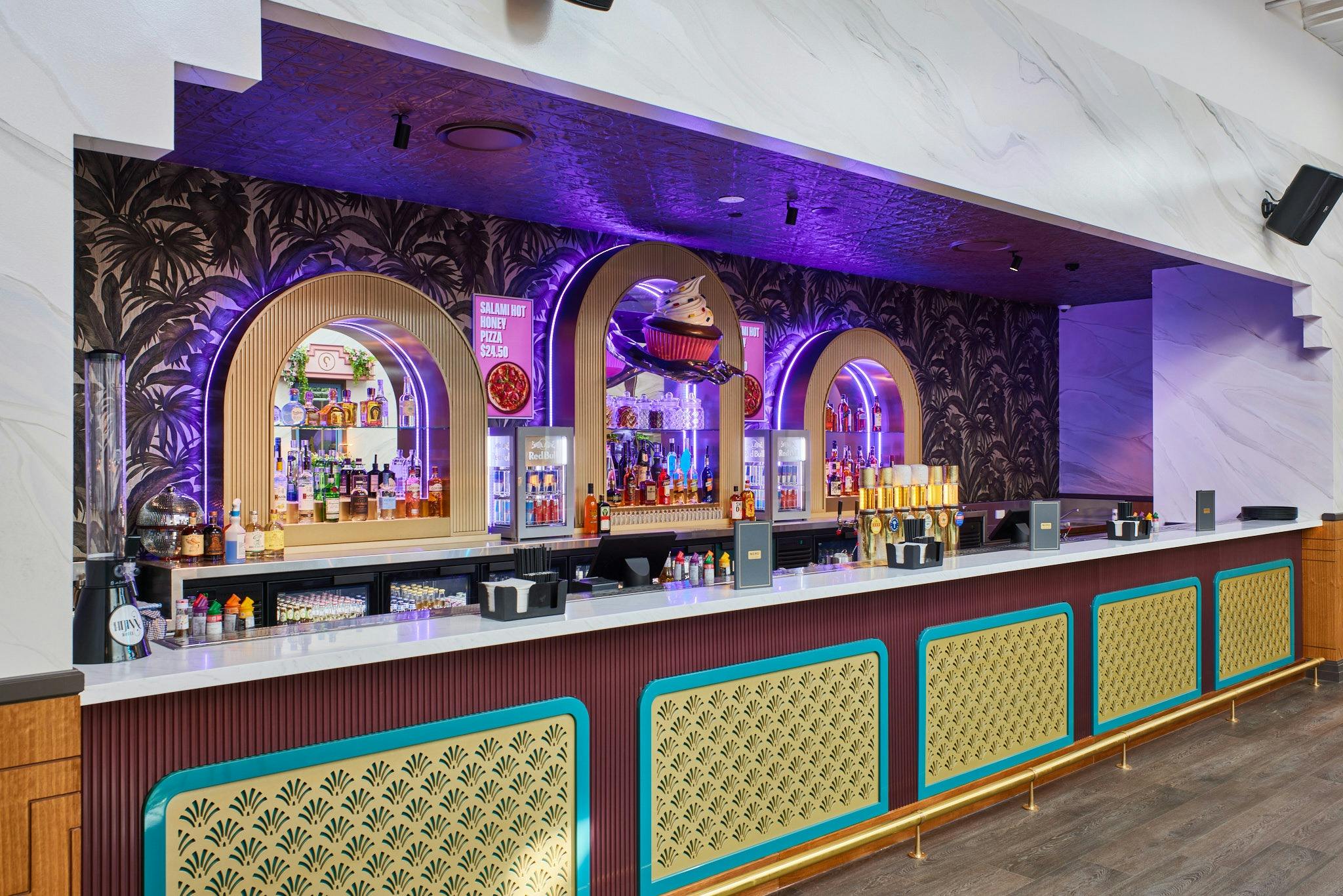 Grab your favourite cocktail at Holey Moley Chermside