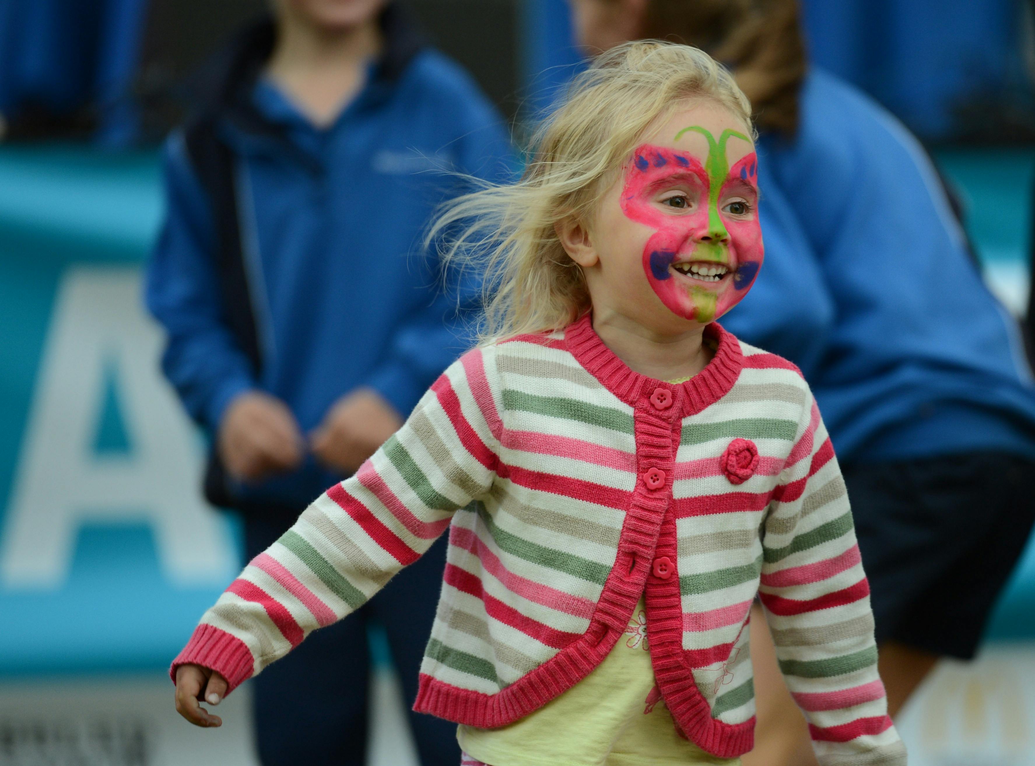 face painted kids having fun