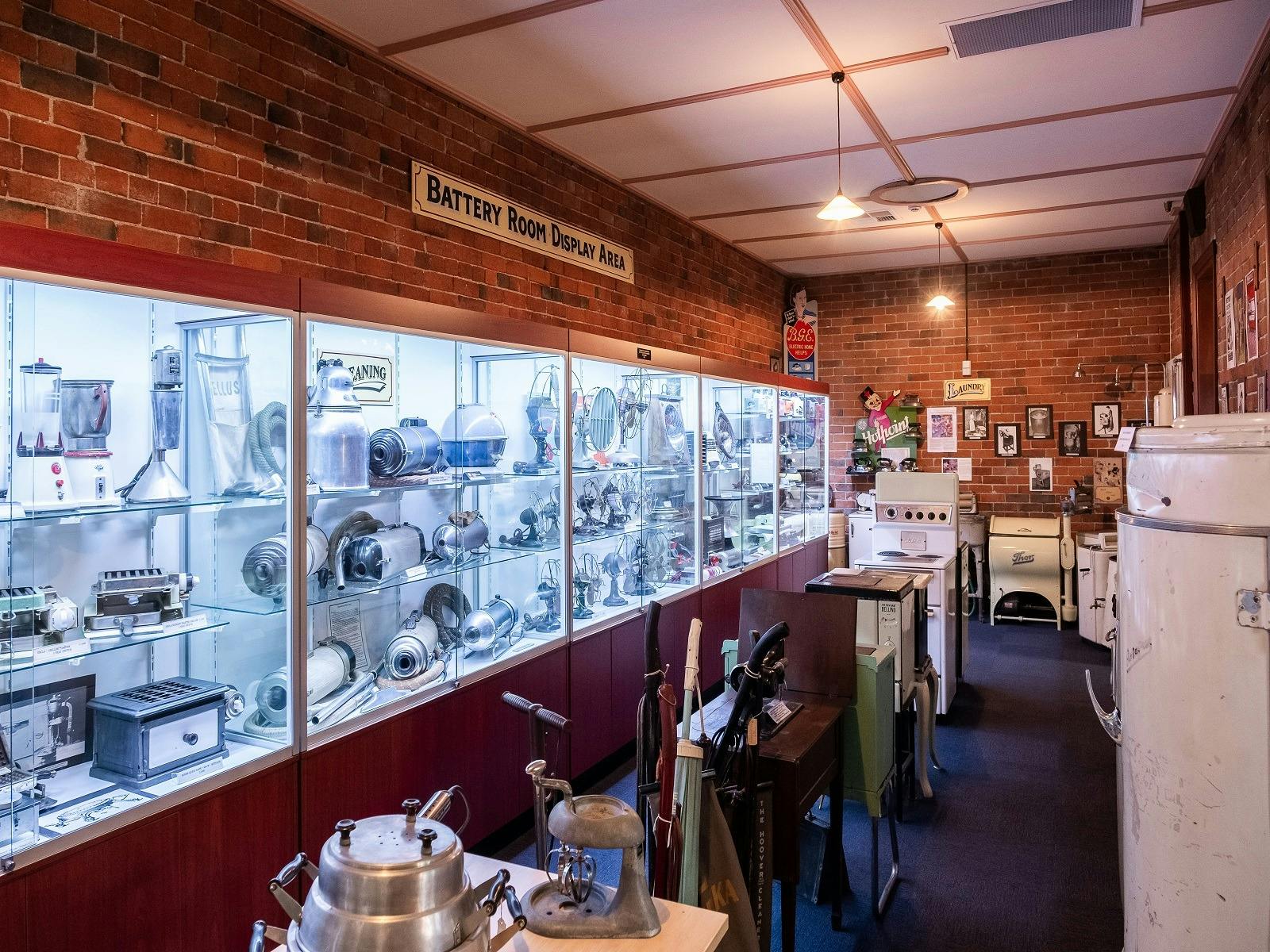 Photo of the display cabinet inside the musuem with a collection of different things