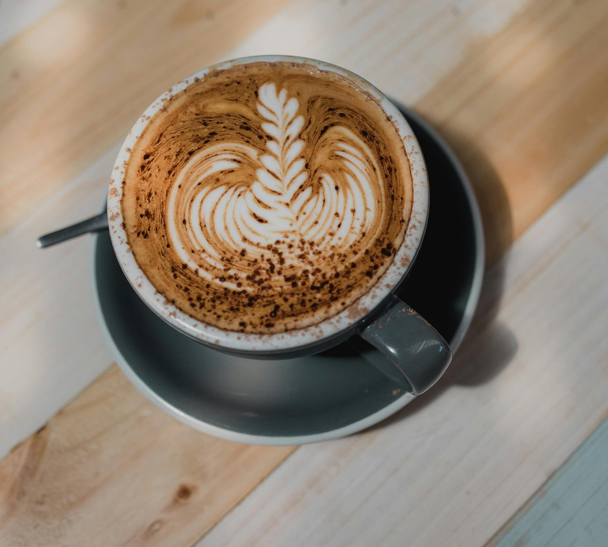 A beautiful coffee with latte art on top