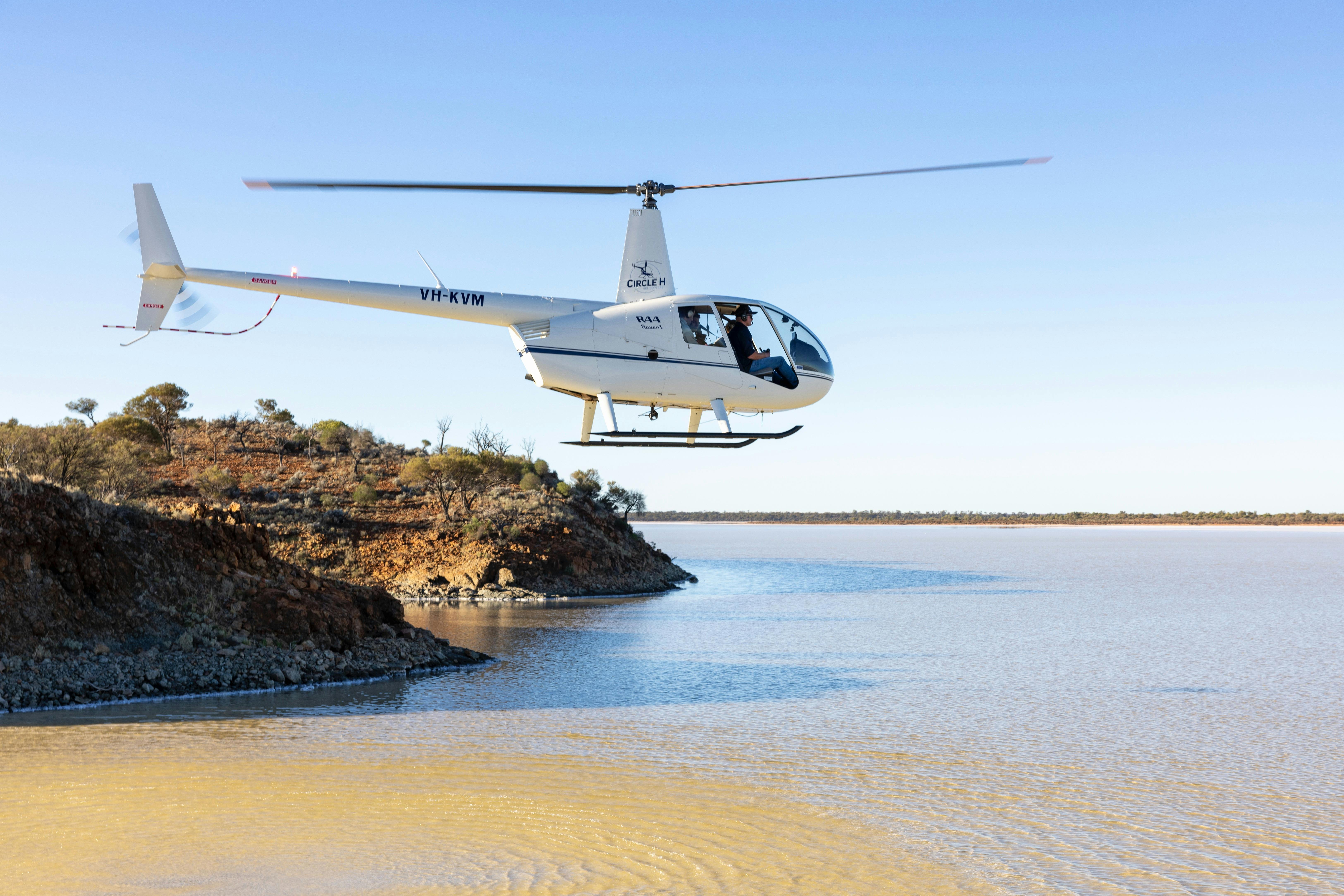 Helicopter flying over Lake